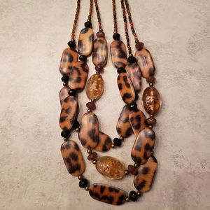 Beautiful, 3 strand animal print necklace. Worn once or twice.
